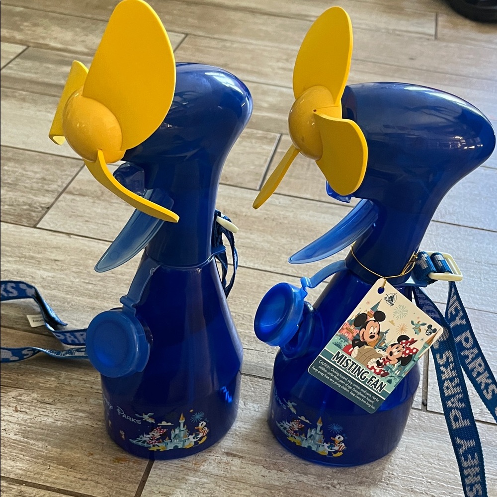 Two Disney parks mister bottles with fan and neck strap